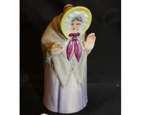 A Royal Worcester candle snuffer "Granny snow" date marked for 1922