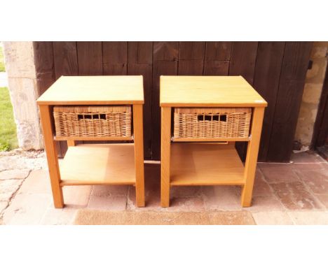 A pair of modern beech side tables, the plain top above a raffia drawer to a pot shelf beneath, raised on square legs