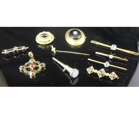 Four various yellow metal and stone set bar brooches, together with a yellow metal and pearl set tie pin, a white metal mount