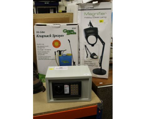 A Kingavon electronic safe, a Lloytron magnifier desk lamp and a Green Blade knapsack sprayer*