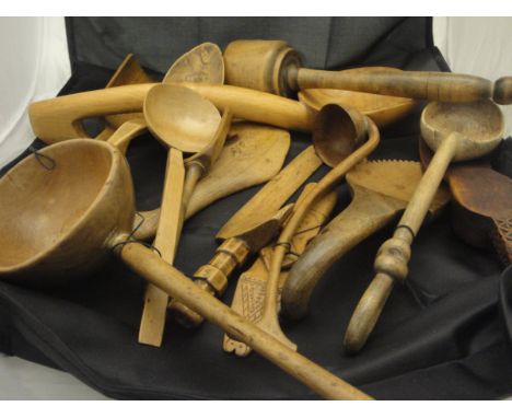 A large collection of mainly 19th Century treen ware to include 3 pestles, various bowls, spoons, ladles and scoops, spice gr
