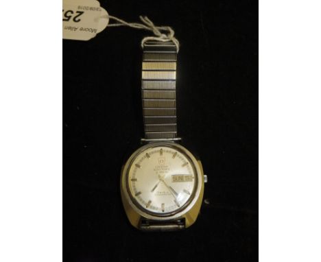 A gentleman's Omega Electroni S300 HZ Genevieve chronometer watch, the brushed steel dial set with markers and date marker