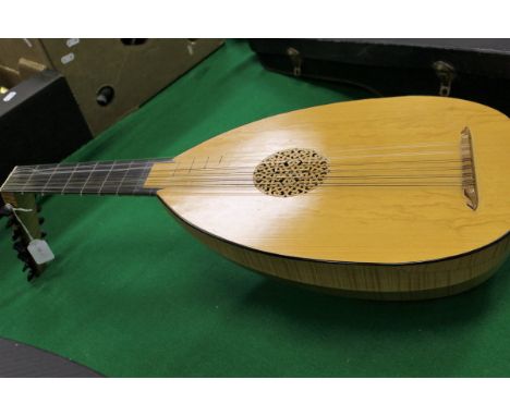 A moden maple lute by Stanley Doubtfire, unsigned CONDITION REPORTS There is no case with this.  Some small  impressed marks 