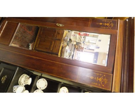An Edwardian mahogany and inlaid single mirror door wardrobe together with a firescreen, a print and a cast iron fire basket