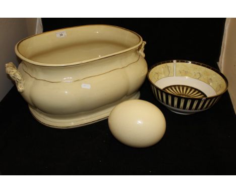 A Victorian cream glazed pottery foot bath, a modern Royal Worcester Celebration 2001 collection Limited Edition fruit bowl n