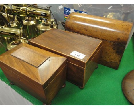 A Victorian burr walnut dome topped two section tea caddy, a Victorian mahogany sarcophagus shaped two section tea caddy and 