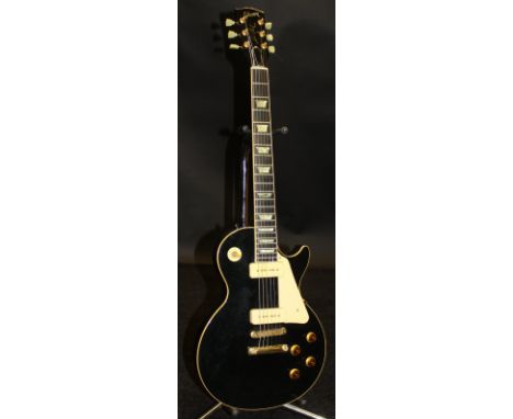 A Gibson Les Paul "40th Anniversary Model", black finish, Serial No. 91421448, inscribed verso "Anniversary Limited Edition" 