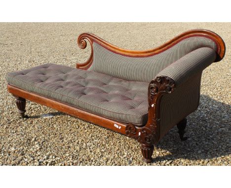 A Victorian carved rosewood framed chaise longue on beaded legs with green and plum checked upholstery CONDITION REPORTS One 