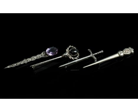 Scottish Early 20th Century - Sterling Silver Stone Set Celtic Sword Brooches ( 4 ) In Total. Set with Amethyst / Black Pebbl