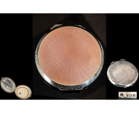 Art Deco Period Pink Enamel and Sterling Silver Compact Case of Circular Form with Full Hallmark. Weight 75 grams. 