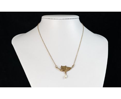 Ladies 9ct Gold Novelty Cat &amp; Pearl Necklace/Drop.  The central feature figure of cat with pearl on a swing drop, marked 