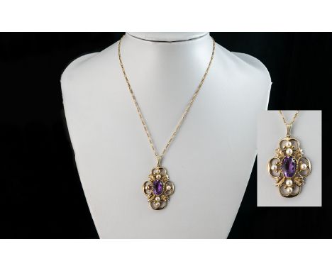 A Fine Quality 9ct Gold Openworked Amethyst and Pearl Set Pendant, of elaborate form, with attached 9ct gold chain.  Both pen