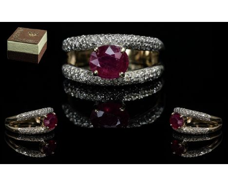 Ladies 9ct Gold Contemporary Ruby &amp; Diamond Set Fashion Ring.  Two bands of diamonds with Ruby set between.  Ring size . 