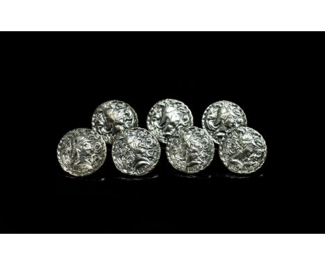 A Collection of Seven Silver Buttons, all with case Grecian decoration, hallmark Birmingham a 1900. 