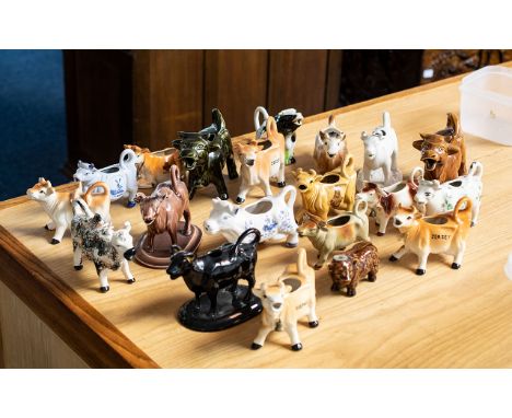 Large Good Collection of Porcelain Cow Creamers. Various Shapes, Sizes and Makes. Includes Staffordshire, Jersey Cows, Arthur