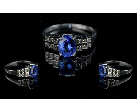 Ladies Contemporary Designer 18ct White Gold Blue Sapphire and Diamond Set Ring, full hallmark for 750 - 18ct to shank; the c