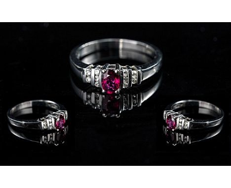 Ladies Contemporary and Attractive 18ct White Gold Ruby and Diamond Set Ring of superior quality, full hallmark for 18ct - 75