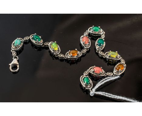 Multicoloured Opal Line Bracelet, the beautiful oval cut cabochon, Ethiopian opals in a range of colours, green, blue, yellow