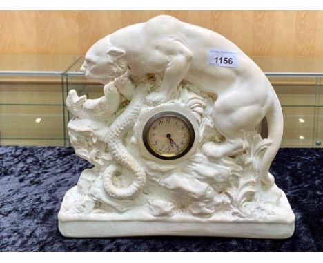 A Panther and Snake Alabaster Base with a Central Clock (1920's) number RD803644 marked OP267. 