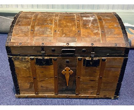 Large Wooden Metal Bound Trunk, with a collection of small rugs.  Trunk full of small rugs, various sizes and designs.