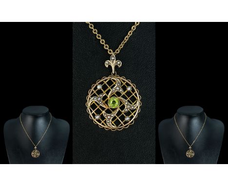 Edwardian Period 1902 - 1910 Superb Peridot and Seed Pearl Set Circular Open Worked Pendant, Attached to a Long 9ct Gold Chai