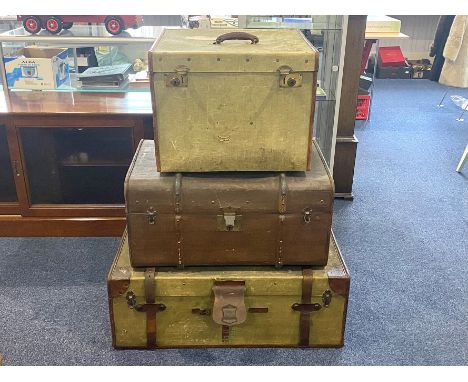 Three Vintage Large Travelling Trunks, comprising:  1.  Selfridges large travelling trunk, label to inner, leather carry hand