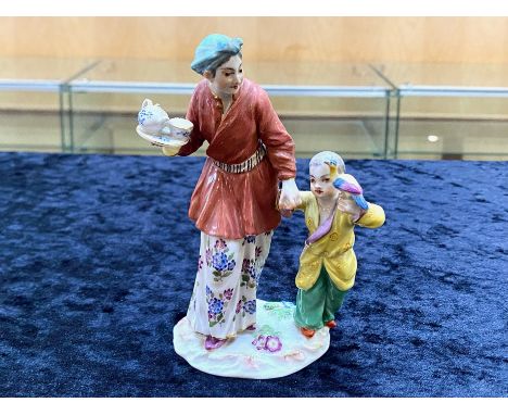 Meissen 19th Century Hand Painted Porcelain Figure 'Mother and Child', with an exotic bird perched in the left hand of the ch