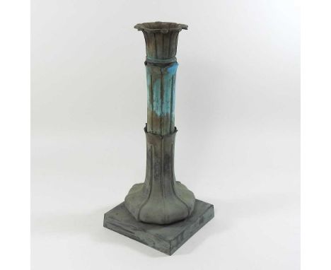 A 19th century cast metal table lamp base, of organic form, on a square plinth base39cm high