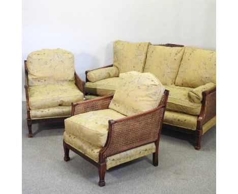 An early 20th century double cane bergere suite, comprising a sofa and a pair of armchairs155w x 85d x 87h cmCondition report
