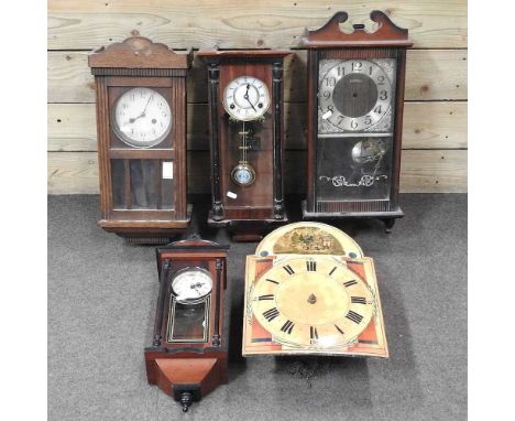 A collection of four various wall clocks, together with a clock dial, 30 x 41cm (5)