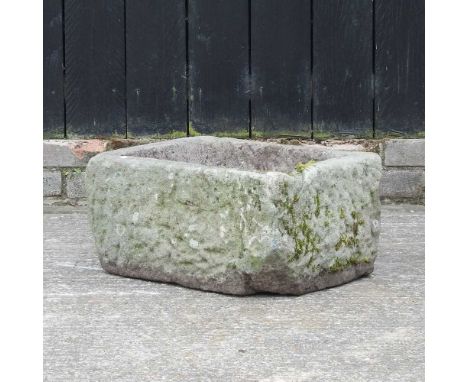 A carved stone trough50w x 37d x 25h cm