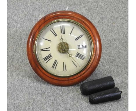 A Victorian postman's alarm clock, with a painted dial and weight driven movement29cm diameterCondition report: The dial and 