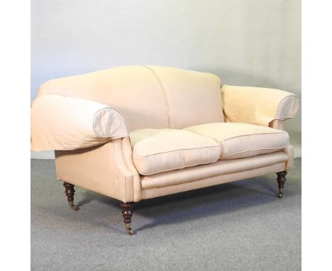A gold upholstered two seater sofa, on turned legs, by Highly Sprung184w x 92d x 95h cm