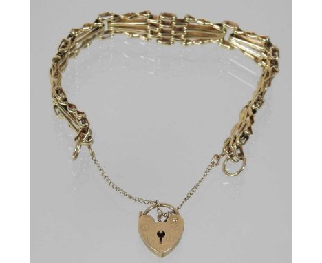 A 9 carat gold gate bracelet, with a 9 carat gold padlock shaped clasp, 14.5g