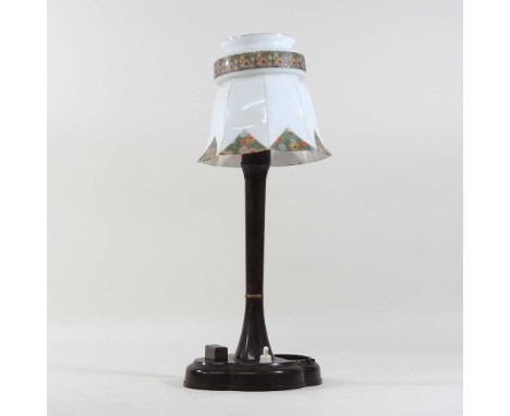 A 1930's bakelite table lamp, with a painted opaque glass shade39cm high