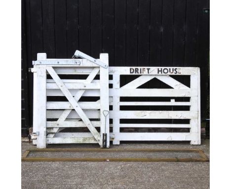 A white painted wooden gate, together with another smaller (2)Large gate: 226w x 111hcmSmall gate: 98w x 123h cm