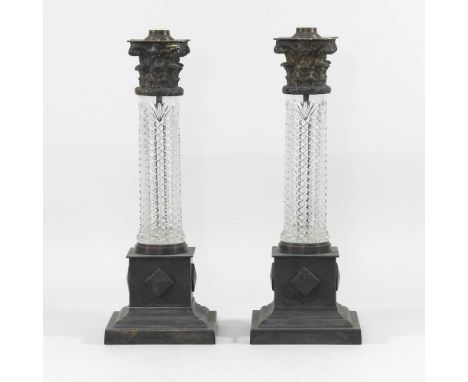 A pair of early 20th century cut glass table lamp bases, each in the form of a Corinthian column, with brass mounts (2)40cm h