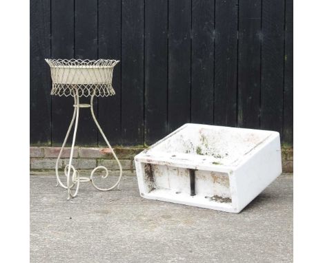 A white glazed butler's sink, together with a white wirework planter, 77h cm62 x 54cm
