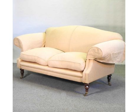 A gold upholstered two seater sofa, on turned legs, by Highly Sprung184w x 92d x 95h cm