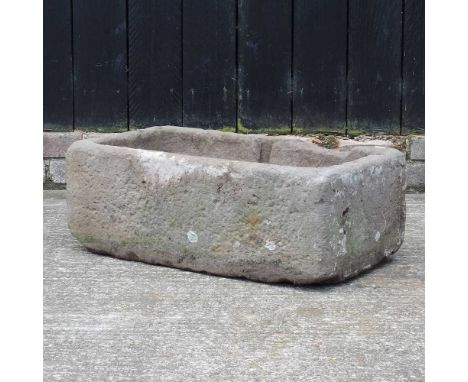 A carved stone garden trough67w x 37d x 24h cm