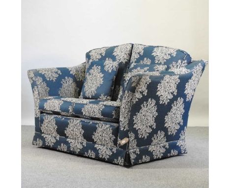 A blue floral upholstered sofa, of square shape147w x 86d x 99h cmCondition report: Overall condition is ok, with no visible 