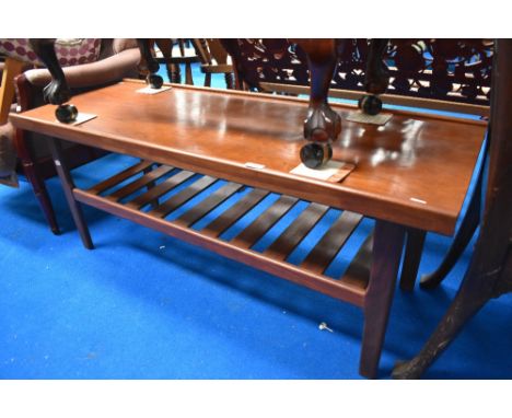 A mid century teak coffee table with under shelf, dimensions approx. 122 x 46cm, height 50cm