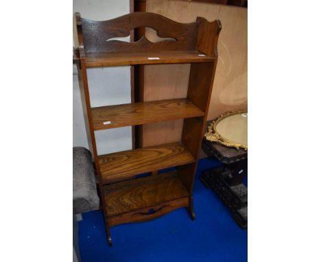 An early 20th century oak book shelf.