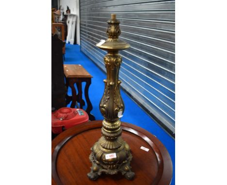 A vintage brass table lamp of foliate design