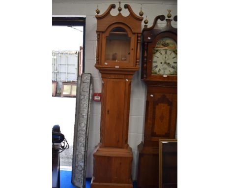 A modern Pine wood long case clock cabinet.