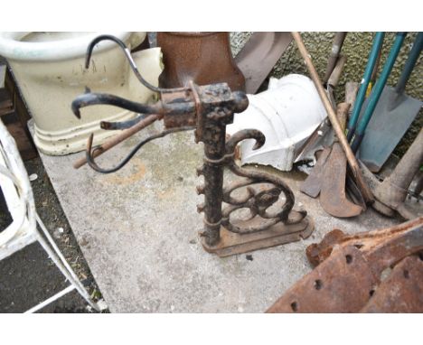 A Victorian cast iron gas lamp bracket.