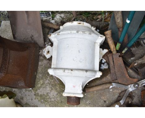 A large cast iron Victorian water hopper.
