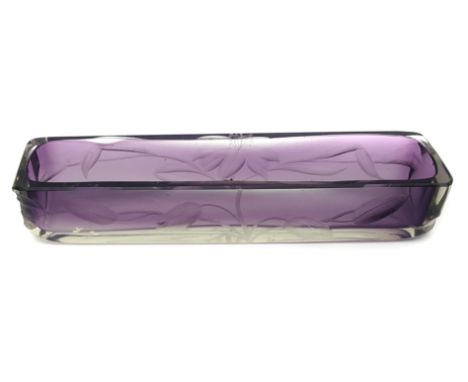 A Moser Intaglio cut glass pen tray, the graduated amethyst glass deeply cut with lily flowers and leaves, 20cm max