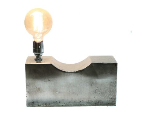 AN AUTOPSY HEADREST,20th century, head block used during autopsies to hold the subject's head, converted into a desk lamp,16 