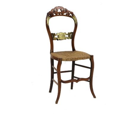 SIEGE OF SEVASTAPOL,1855, an attractive Crimean War rush-seated mahogany chair, the brass back splat engraved, ‘Taken from Se